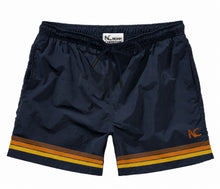 Navy shorts with orange and yellow stripes on a white background