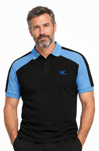 A man wearing a black and light blue short-sleeve polo shirt with a blue 'NC' logo on the chest, photographed against a plain white background.