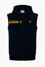 A sleeveless zip-up hoodie vest in navy blue, featuring three horizontal orange stripes on the left chest, a drawstring hood, a front kangaroo pocket, and an orange embroidered 'NC' logo on the right chest. The brand label inside the collar reads 'N.